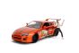 Toyota Supra with Chainsaw Man Figurine