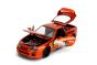 Toyota Supra with Chainsaw Man Figurine